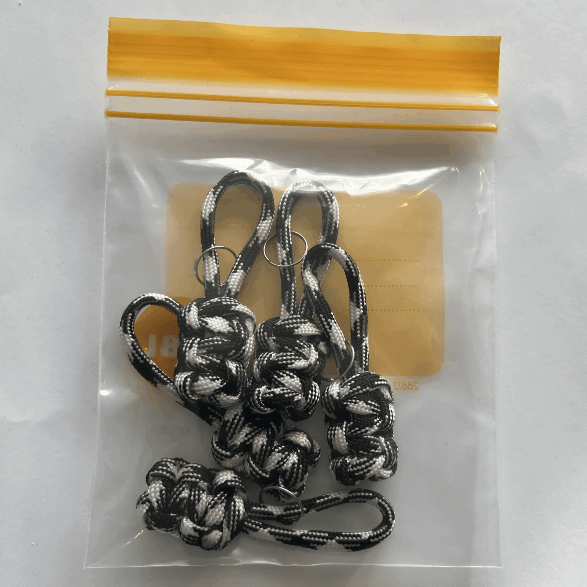 Zipper-puller-6cm-camo-musta-valko Zipper-puller-6cm-camo-musta-valko